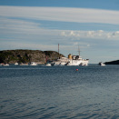 May boats accompany the Royal Yacht out of Stokksundet (Photo: Ned Alley / NTB scanpix)